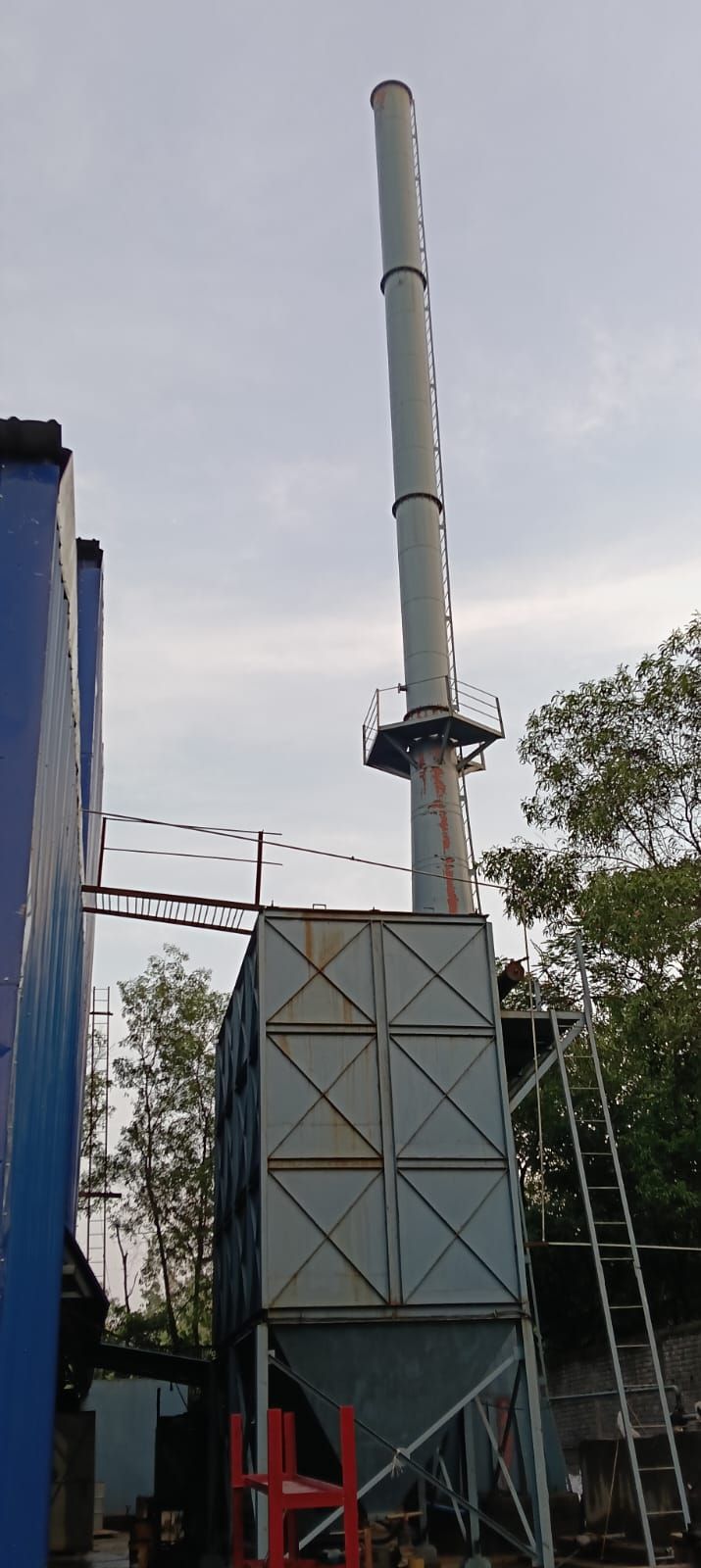 Tall emission stacks at the plant